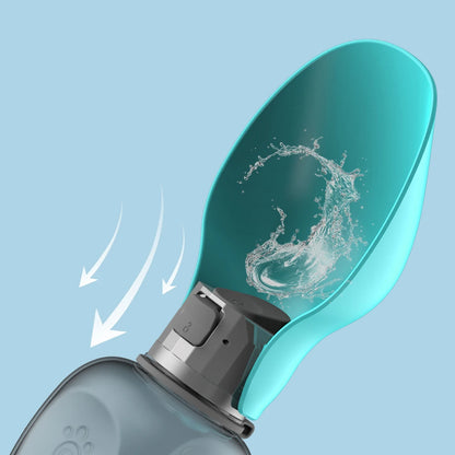 Teal water bottle spout with water splash on a light blue background