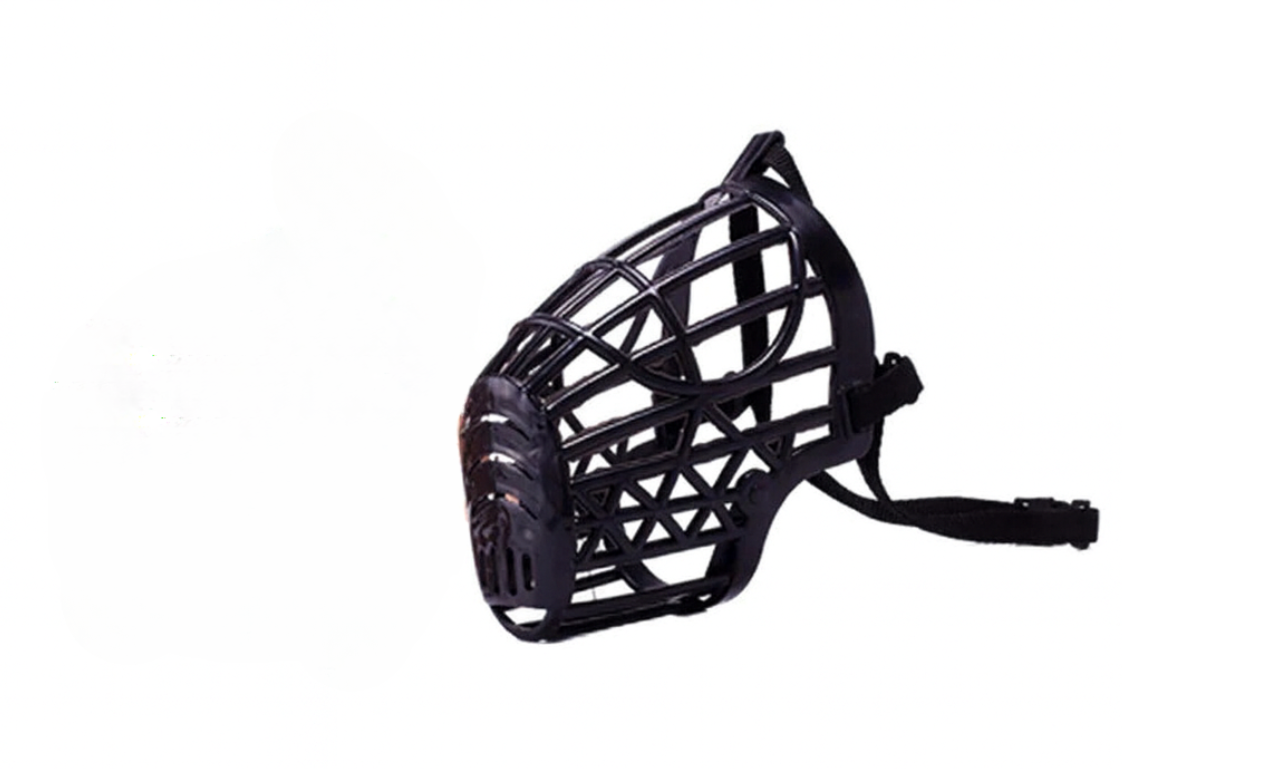 Black dog muzzle with a mesh design on a white background