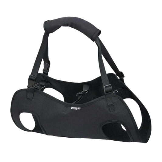 Black pet harness on a white background